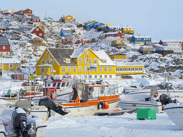 The frozen harbor of Uummannaq during winter in northern West Greenland beyond the Arctic Circle. Greenland, Danish territory