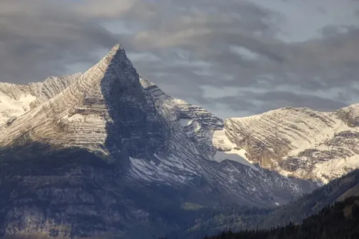 Framed Print : Fusillade mountain in Glacier National Park in Montana after autumn snow Framed Print : Fusillade mountain in Glacier National Park in Montana after autumn snow