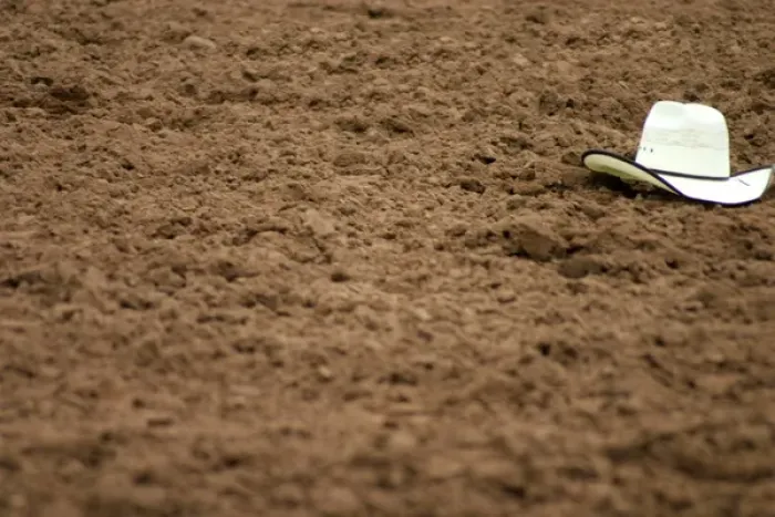 Framed Print : Galisteo, New Mexico, United States. Rodeo hat left in dirt at Galisteo Rodeo