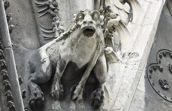 Gargoyle perched on Notre Dame cathedral, Paris, France