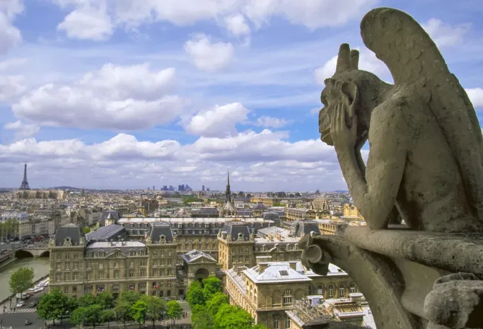 Framed Print : Gargoyle on the roof of Notre Dame cathedral looks out over Paris, France Framed Print : Gargoyle on the roof of Notre Dame cathedral looks out over Paris, France