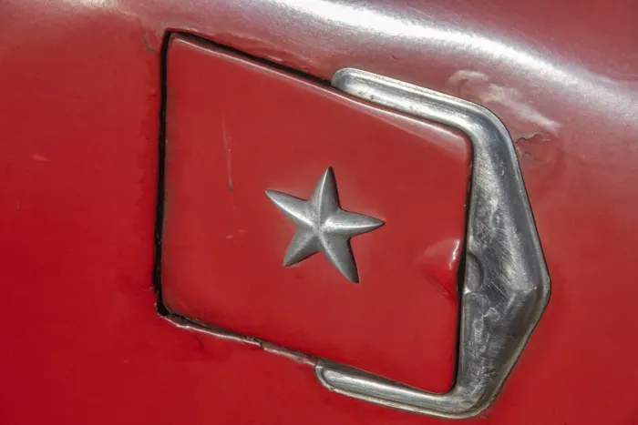 Framed Print : Detail of gasoline tank door with star on classic American car in Vieja, old Habana Framed Print : Detail of gasoline tank door with star on classic American car in Vieja, old Habana