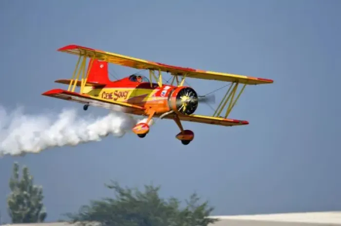 Framed Print : Gene Soucy performing aerobatics in Grumman Biplane Showcat, Oshkosh 2006