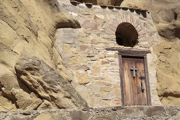 Georgia, Kakheti. A building built into a rockface at the David Gareja Monastery