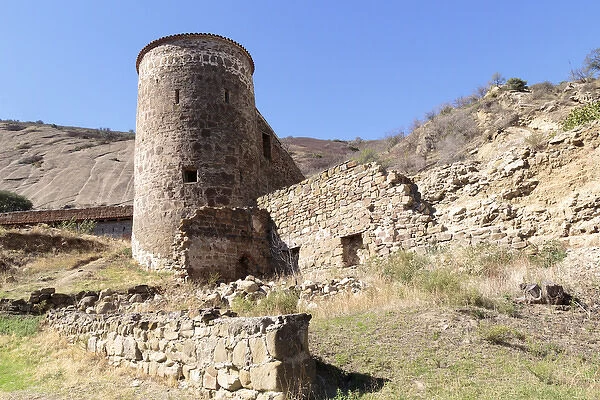 Georgia, Kakheti. A deteriorating wall and tower at the David Gareja Monastery