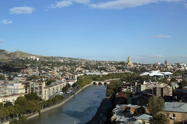 Georgia, Tbilisi. A view from above of downtown Tbilisi and the Mtkvari river, with