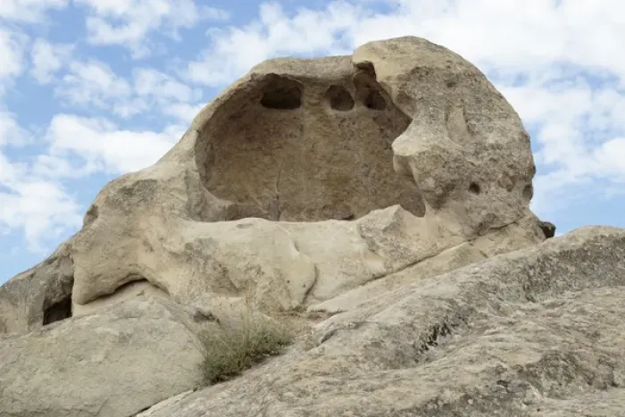 Framed Print : Georgia, Uplistsikhe. A section of carved stone holes