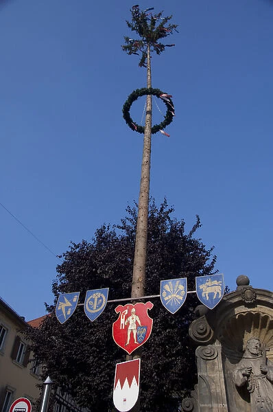 Germany, Bamberg. Maypole with medieval signs