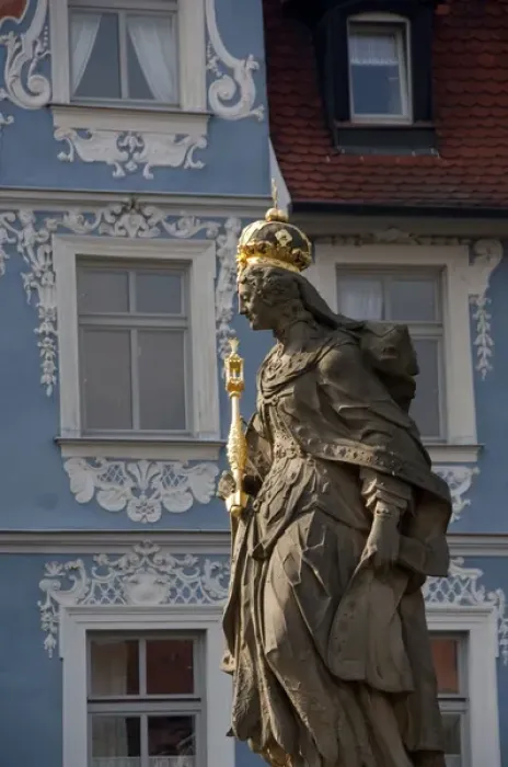 Framed Print : Germany, Bamberg. Royal statue of Kaiserin Kunigund in front of ornate blue & white Framed Print : Germany, Bamberg. Royal statue of Kaiserin Kunigund in front of ornate blue & white