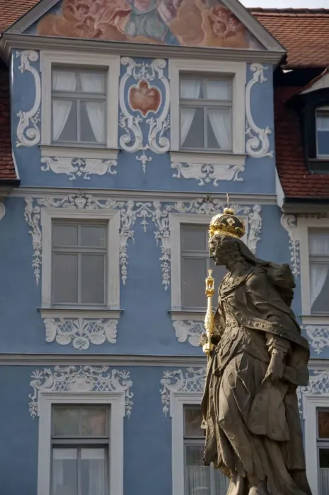 Framed Print : Germany, Bamberg. Royal statue of Kaiserin Kunigund in front of ornate blue & white Framed Print : Germany, Bamberg. Royal statue of Kaiserin Kunigund in front of ornate blue & white