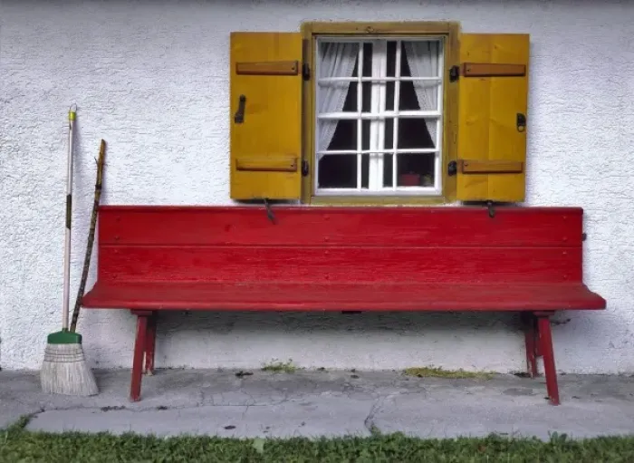 Framed Print : Germany, Bavaria, Almbachklamm. A bright red bench welcomes visitors to this home Framed Print : Germany, Bavaria, Almbachklamm. A bright red bench welcomes visitors to this home