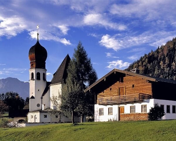 Germany, Bavaria, Berchtesgaden. A small onion-domed church welcomes visitors