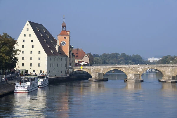 Germany, Bavaria, Regensburg. Historic Salt House & clock tower with the Old Stone