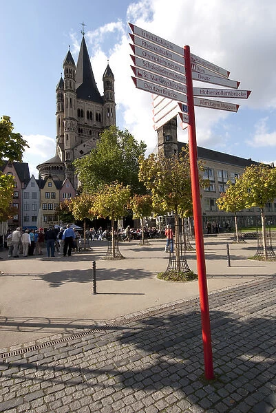 Germany, Cologne (aka Koln). Historic waterfront area with St. Martin church in distance