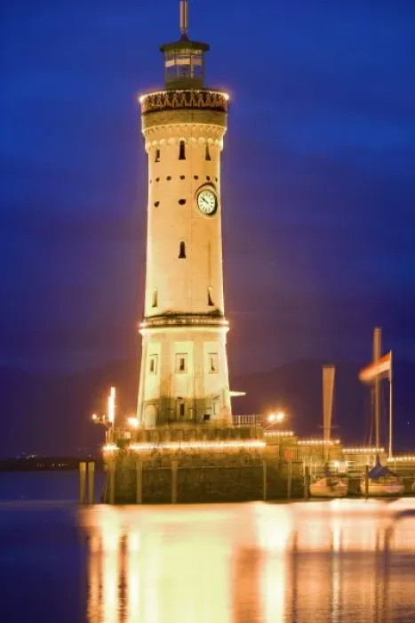 Framed Print : Germany, Lake Constance. View of lighthouse on Lindau Island at sunset
