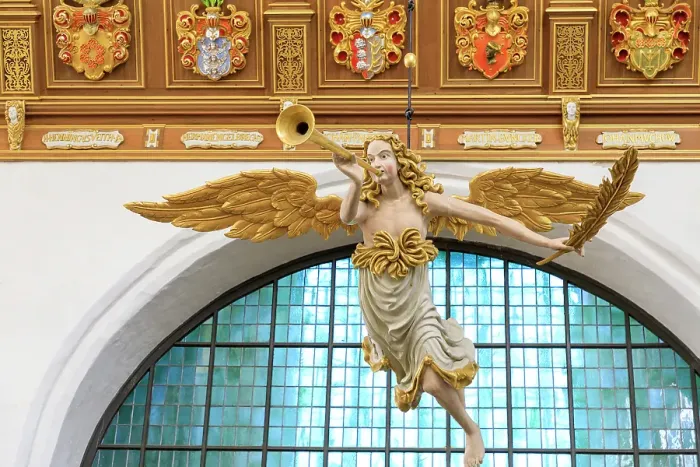 Framed Print : Germany, Mecklenburg-Vorpommern, Stralsund. St. Mary's Church interior, UNESCO World Heritage Site. Hanging figure of angel blowing trumpet. (Editorial Use Only)