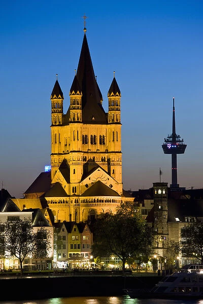 GERMANY, Nordrhein-Westfalen, Cologne. Gross St. Martin church and TV tower, dusk