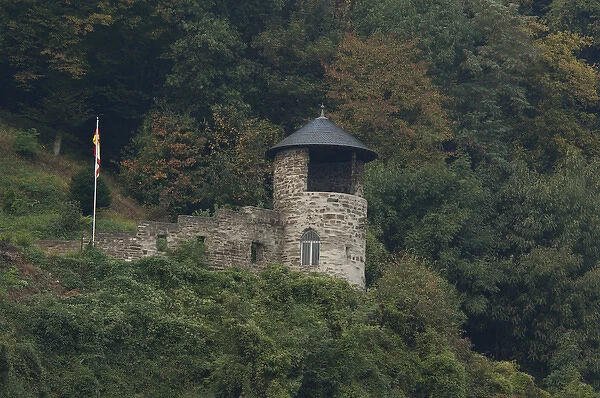 Germany, Remagen. Rhine River views of historic watch tower at mile marker 634