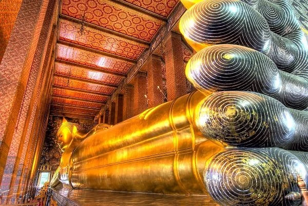 Giant reclining Buddha inside temple, Wat Pho, Bangkok, Thailand. Credit as: Jones-Shimlock