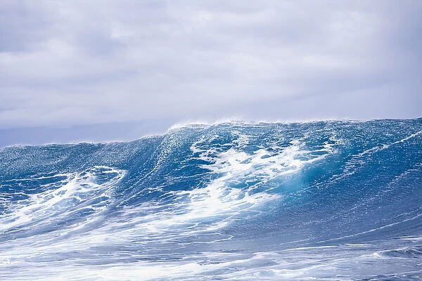 Giant wave breaks near Jaws Maui North Shore, Hawaii, USA