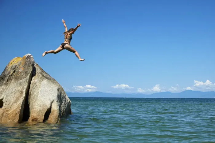 Framed Print : Girl jumping off rock, Mosquito Bay, Abel Tasman National Park, Nelson Region, South Island Framed Print : Girl jumping off rock, Mosquito Bay, Abel Tasman National Park, Nelson Region, South Island