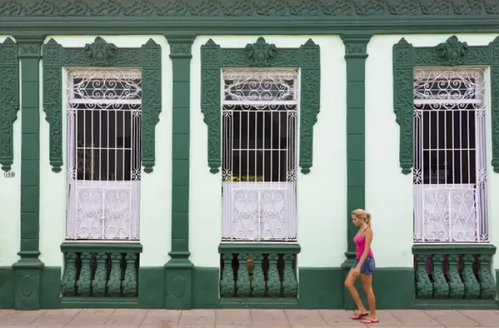 Framed Print : Girl passying an old house, Trinidad, UNESCO World Heritage site, Cuba