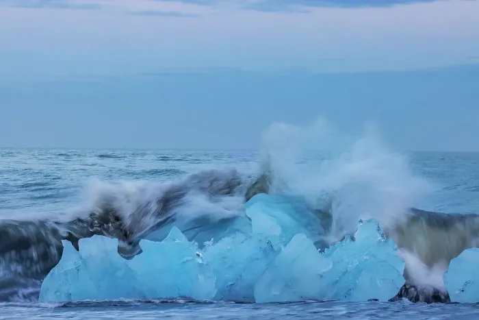 Framed Print : Glacial ice in the surf along the Diamond Beach near Kalfafellsstadur, Iceland