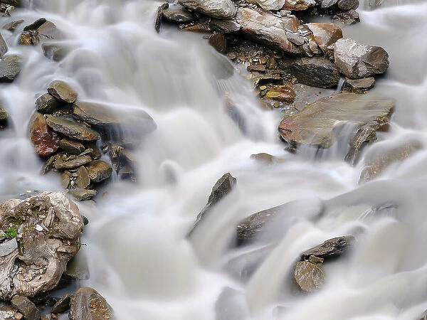 Glacial stream Rotmoosache in the Otztal Alps in the Naturepark Otztal. Europe, Austria, Tyrol