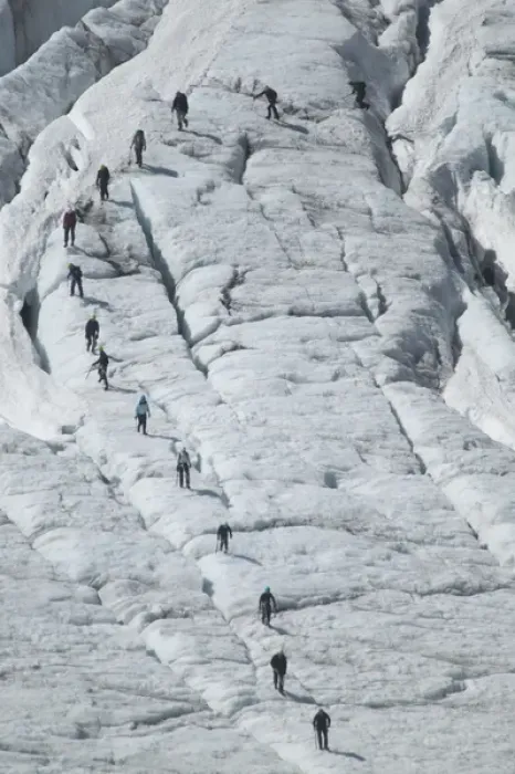 Framed Print : Glacier hikers wind through the blue ice crevices and over snow fields of Folgefonna Glacier Framed Print : Glacier hikers wind through the blue ice crevices and over snow fields of Folgefonna Glacier