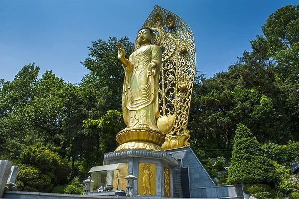Golden buddha in the Unesco world heritage sight the fortress of Suwon, South Korea