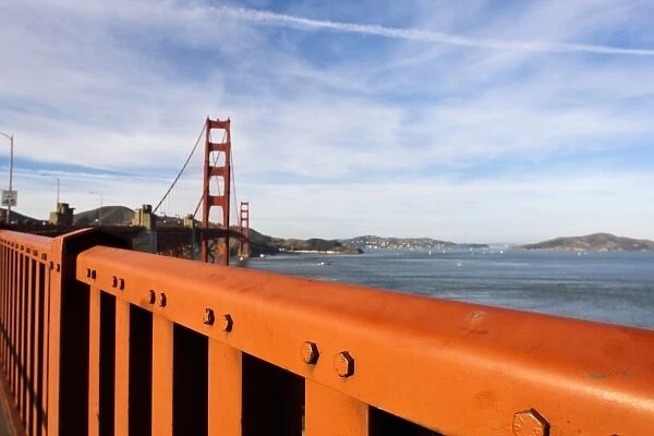 The Golden Gate Bridge as seen over the guard railing from San Francisco, California