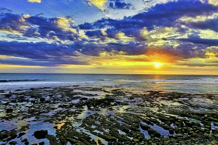 Framed Print : The golden light of the setting sun reflects a gold glow on the beach at Pererenan Beach, as the waves roll in on Bali, Indonesia Framed Print : The golden light of the setting sun reflects a gold glow on the beach at Pererenan Beach, as the waves roll in on Bali, Indonesia