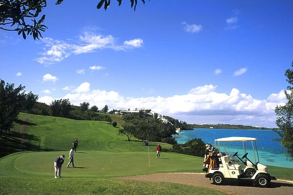 Golfing at the wonderful colorful Castle Harbour Course in Bermuda vacation holiday