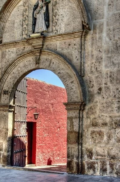 Graceful archway entrance to Monasterio Santa Catalina in the White City of Arequipa, Peru