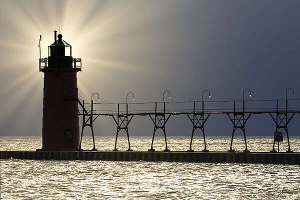 Grand Haven Lighthouse and pier with sunstar, Grand Haven, Michigan