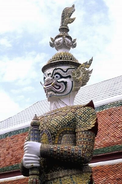 Graphic close-up of statue at Emerald Palace in Grand Palace in Bangkok Thailand