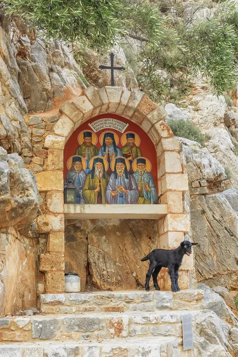 Framed Print : Greece, Crete, Chania. 15th century Greek Orthodox monastery of St. John the Hermit. Cave entrance and goat Framed Print : Greece, Crete, Chania. 15th century Greek Orthodox monastery of St. John the Hermit. Cave entrance and goat