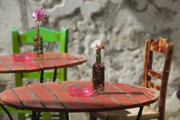 GREECE, CRETE, Hania Province, Hania: Colorful Cafe Table