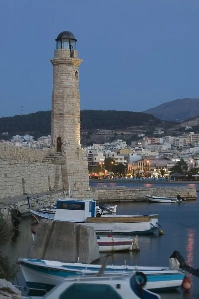 GREECE, CRETE, Rethymno Province, Rethymno: Venetian Harbor and Lighthouse  /  Dusk