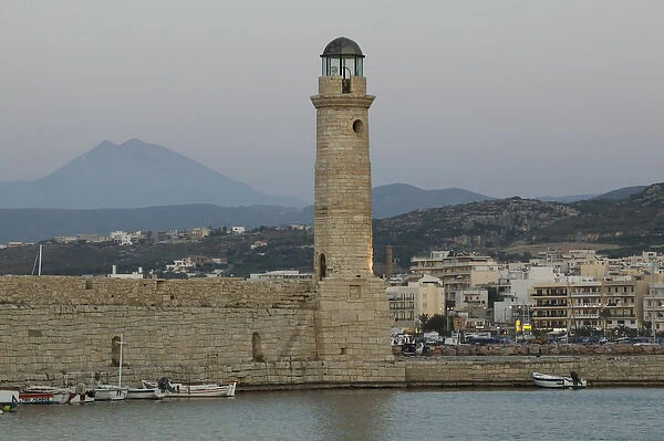 GREECE-CRETE-Rethymno Province-Rethymno: Venetian Harbor with lighthouse  /  Dusk