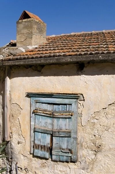 Greece, Crete. Shuttered window in building in town of Kritsa. Lasithi Region