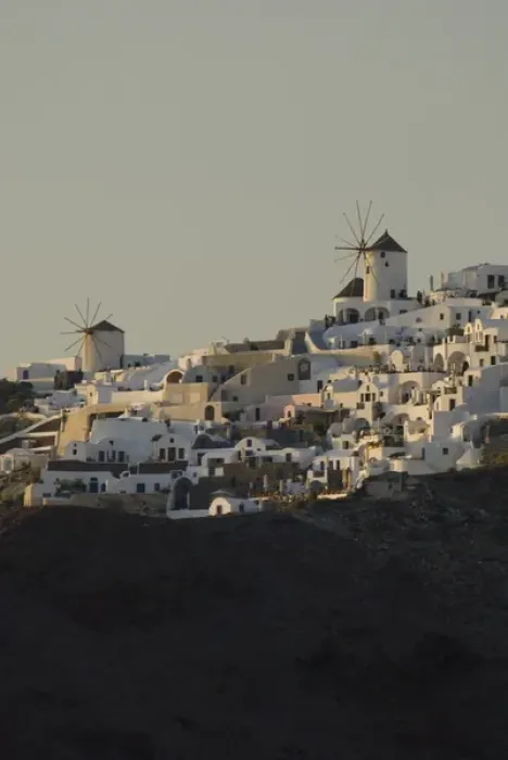 Framed Print : Greece, Cyclades, Island of Santorini (aka Thira) cliff top homes & typical windmill