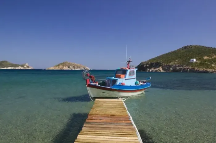 Framed Print : GREECE, Dodecanese Islands, PATMOS, Kampos: Shore view with small boat / Livadi Geranos Framed Print : GREECE, Dodecanese Islands, PATMOS, Kampos: Shore view with small boat / Livadi Geranos