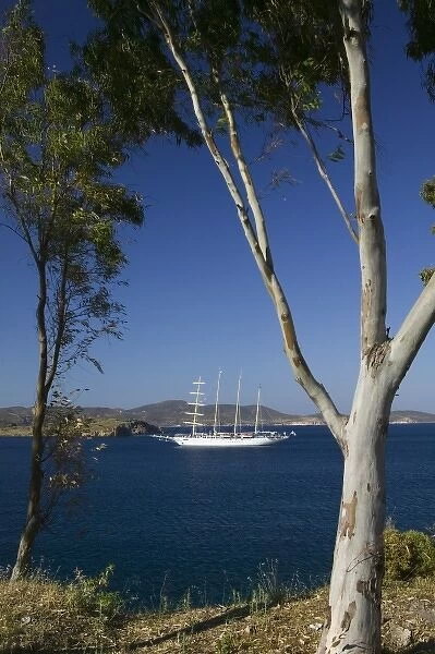 GREECE, Dodecanese Islands, PATMOS, Skala: Sailing Cruiseship at Anchor  /  Skala Bay