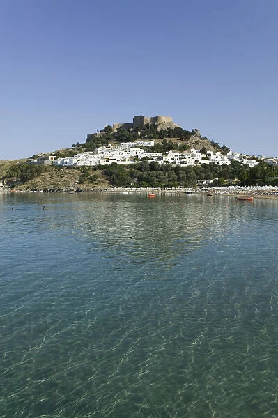 GREECE-Dodecanese Islands-RHODES-Lindos: Lindos Harbor- Beach View with Acropolis