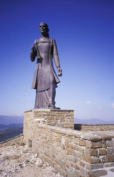 Greece, Epirus, Zagorohoria. Statue of Epirote woman near Monodendri