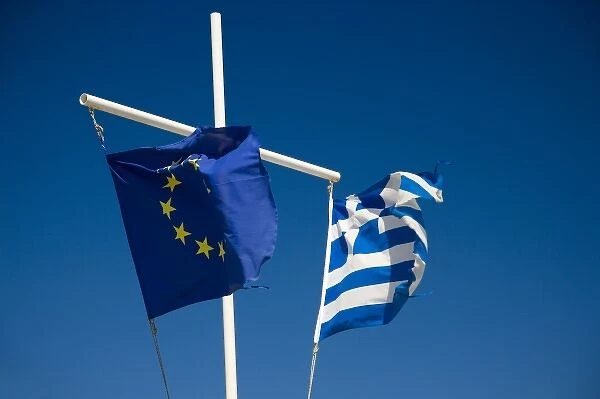 Greece and Greek Island of Mykonos and the harbor town of Hora in harbor flying the European Union