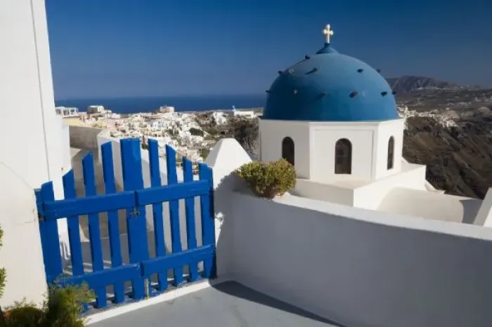 Framed Print : Greece and Greek Island of Santorini from the small town of Imerovigli with blue