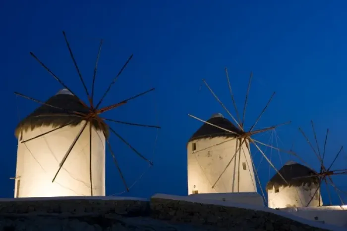 Framed Print : Greece, Mykonos, Hora. Three windmills lit at sunset