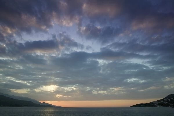GREECE, Northeastern Aegean Islands, SAMOS, Vathy (Samos Town): Sunset over Vathy Bay